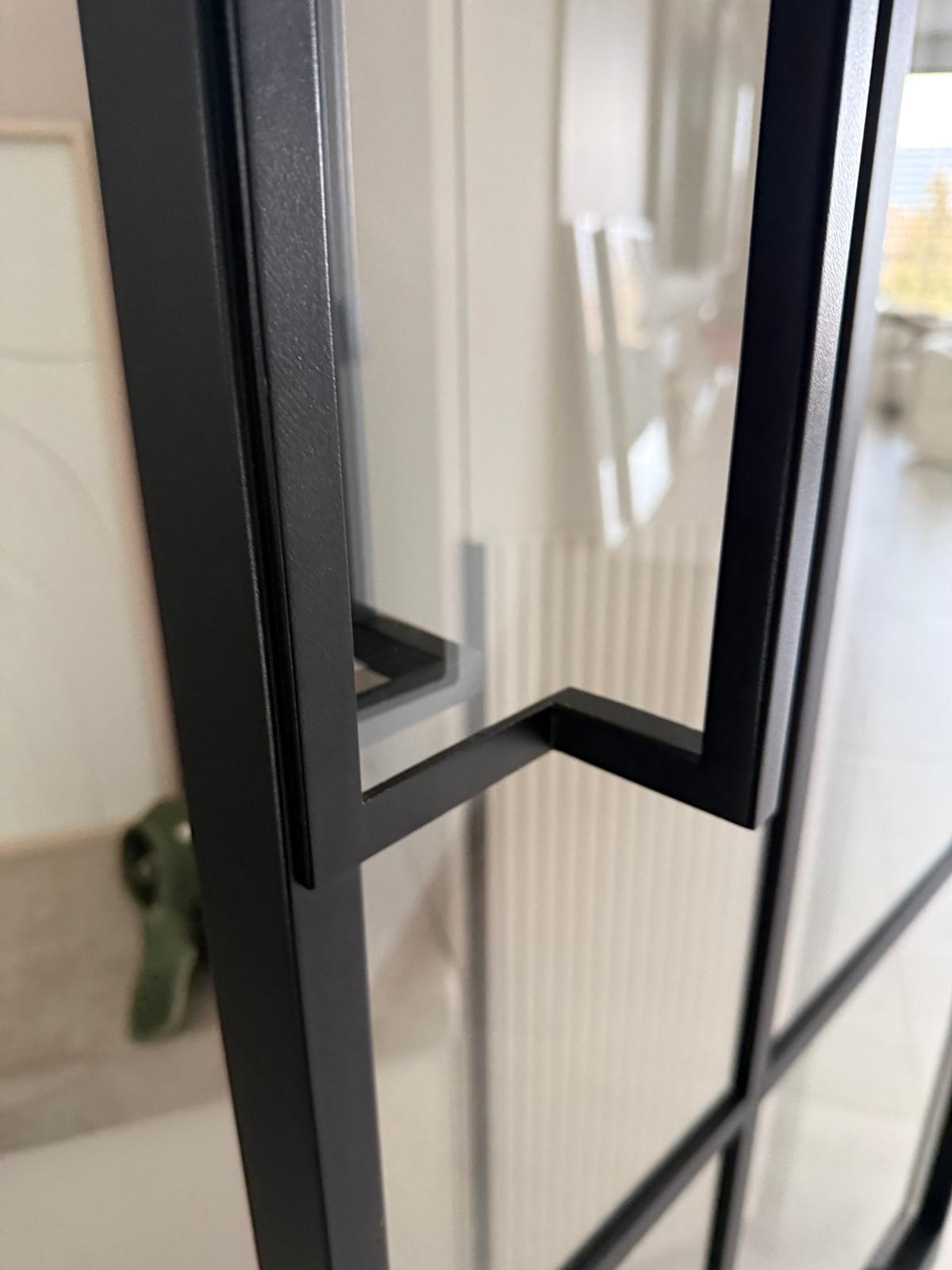 Internal steel doors with distinctive glazing bar layout